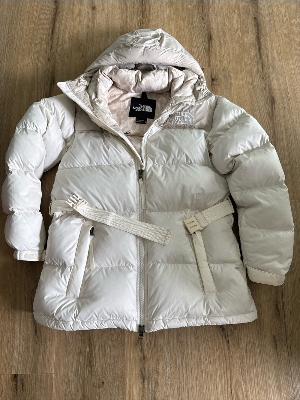 The North Face Women’s Cream White Hooded Puffer Jacket with Belt